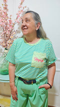 Camiseta here